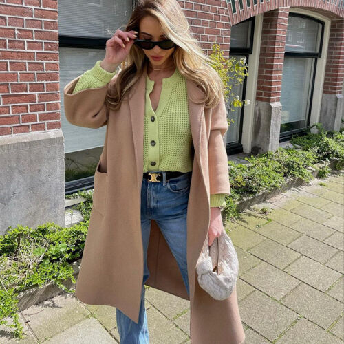 Grof gebreid vest met pofmouwen